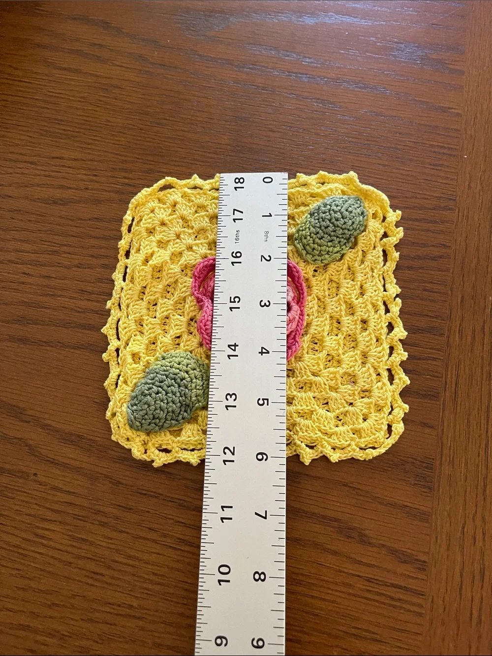 Hand Crafted Yellow Crochet Dishcloth with Pink Flower and Green Accents